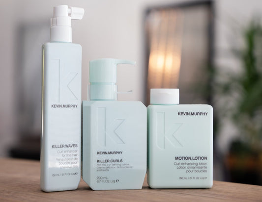 Femme appliquant un rituel capillaire naturel pour lutter contre la chute de cheveux